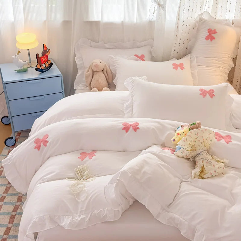 pink white bow + ruffles